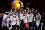 Flashback: San Antonio Spurs Tim Duncan (21) with Larry O'Brien trophy and Tony Parker (9) with Finals MVP trophy victorious with team after winning Game 4 and championship vs Cleveland Cavaliers, Cleveland, OH 6/14/2007  (Photo by John W. McDonough/Sports Illustrated/Getty Images)  (SetNumber: X78260 TK1 R1)